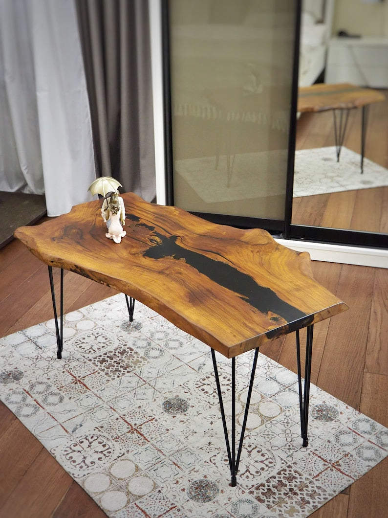 live edge coffee table, epoxy river table, hairpin leg table, modern industrial furniture, walnut epoxy centre table, handcrafted coffee table, minimalist steel legs, resin inlay table, sustainable wood furniture, functional art